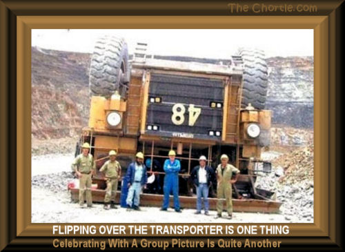 Flipping over the transporter is one thing. Celebrating with a group picture is quite another.