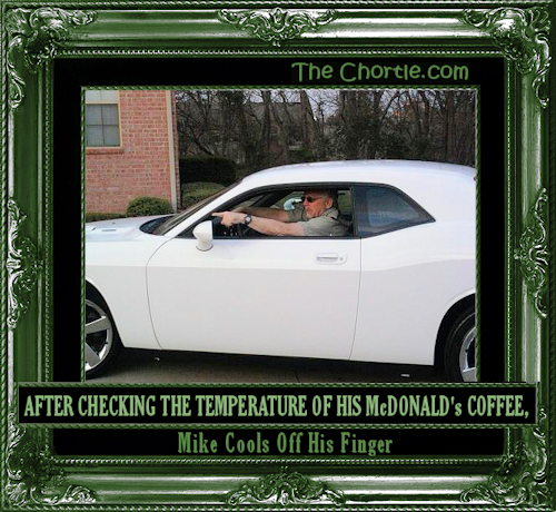After checking the temperature of his McDonald's coffee, Mike cools off his finger