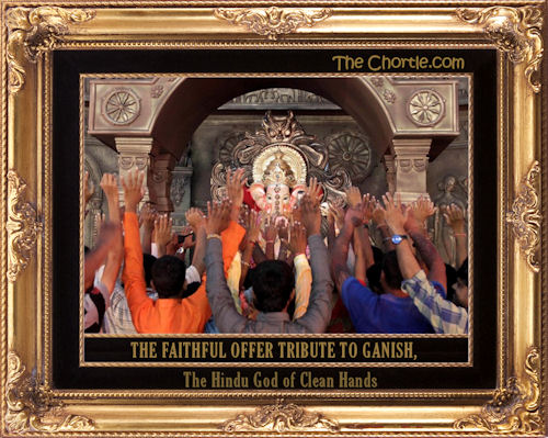 The faithful offer tribute to Ganish, the Hindu god of clean hands