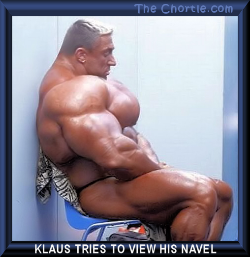 Klaus tries to view his navel.