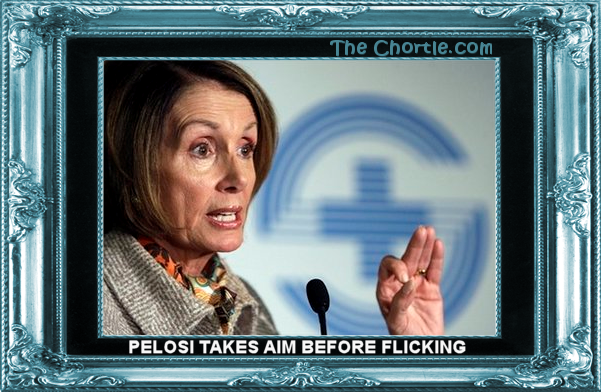 Pelosi takes aim before flicking.
